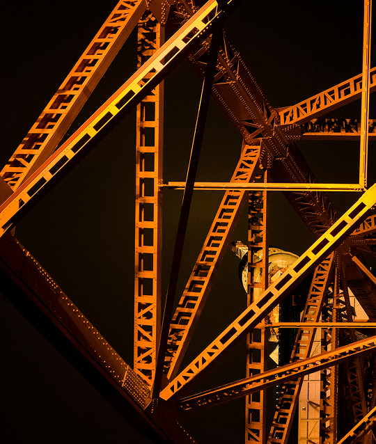Industrial crane framework structure at night